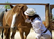 Young woman with the red horse