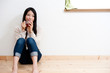 beautiful asian woman drinking a glass of tea