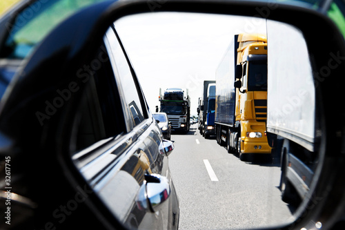 Photo: Truck traffic jam on highway Truck traffic jam on highway