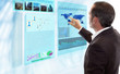Foto: Businessman works with futuristic Display Businessman works with futuristic Display