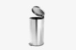 Refuse bin in room corner on white Refuse bin in room corner on white