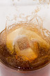 Ice cube drop to soft drink