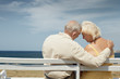 Photo: old man and woman on bench at the sea old man and woman on bench at the sea