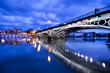 Photo: Sevillie, romantic panorama of the bridge and the riverside Sevillie, romantic panorama of the bridge and the riverside