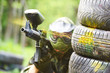 paintball player under gunfire
