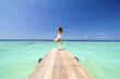 asian yogo on beautiful beach