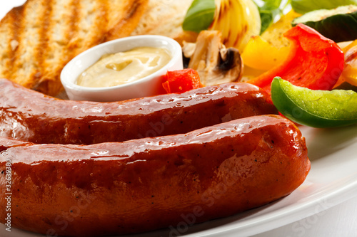 Photo: Grilled sausages and vegetables Grilled sausages and vegetables