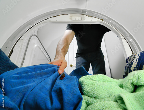Photo: Removing Laundry from a Dryer Removing Laundry from a Dryer