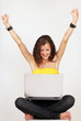 ����: Happy reaction by pretty girl working on laptop � deva #32652311