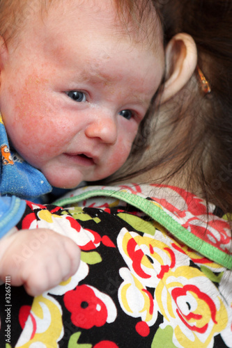Photo: Mother holds baby Mother holds baby