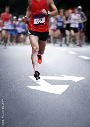 Photo: Marathon runners - blurred motion Marathon runners - blurred motion