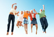 Lively excited multi generational family jumping