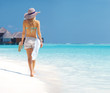 Sensual young woman walking through the beach - Copyspace Sensual young woman walking through the beach - Copyspace