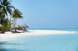 Beautiful beach with chair and umbrella