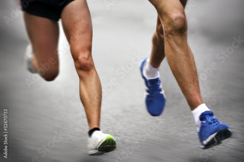 Photo: Marathon runners - blurred motion Marathon runners - blurred motion