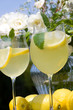 Cocktails with roses in background