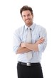 Handsome businessman smiling confidently