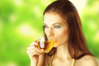 Photo: Beautiful Girl Drinking Healthy Green Tea Beautiful Girl Drinking Healthy Green Tea