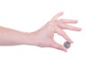 One Euro coin in female hand isolated
