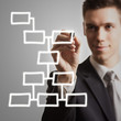 young businessman drawing diagram