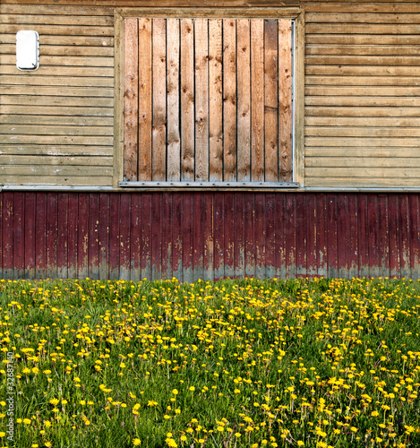 Photo: old russian style exterior with old painted wooden planks buildi old russian style exterior with old painted wooden planks buildi