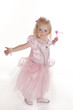Photo: pretty little girl in pink fairy dress dancing pretty little girl in pink fairy dress dancing