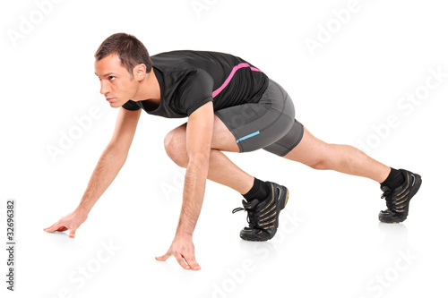 Photo: Male athlete ready to run Male athlete ready to run