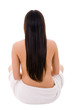 Lovely young nude woman with towel sit of back