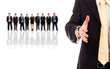 A businessman with an open hand ready to seal a deal