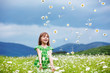 Child at camomile field