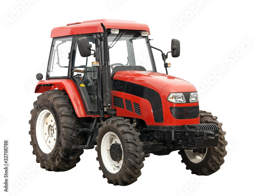 Photo : New red tractor isolated over white background New red tractor isolated over white background