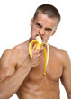 Muscle sexy wet naked young man eating the banana Muscle sexy wet naked young man eating the banana