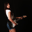 Musikerin mit E Gitarre
