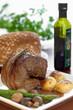 Roast beef with potatoes, asparagus and mushrooms.