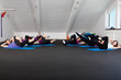 Group of young women doing aerobic exercises