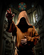 Preaching monk in church