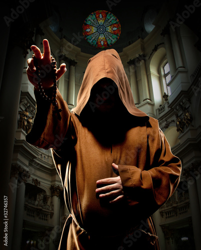 Photo: Preaching monk in church Preaching monk in church
