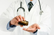 doctor giving pills