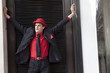 Photo: young serious man in red hat young serious man in red hat