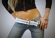Fit woman belly wearing jeans and bijouterie