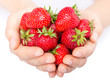 Handful of strawberries close-up