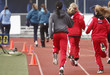 Photo: Runners warming up on a track Runners warming up on a track