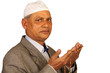 hands with muslim prayer beads