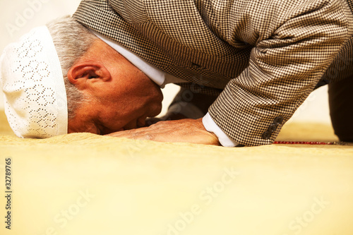 Photo: muslim religion praying. muslim religion praying.