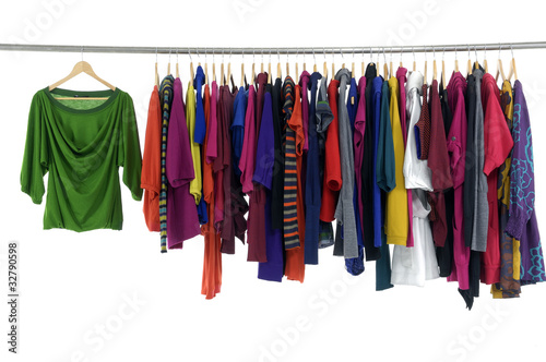 Photo: fashion clothing on hangers at the show fashion clothing on hangers at the show