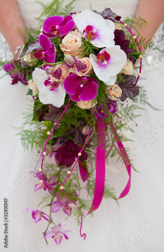 Photo: Bride with bouquet, closeup Bride with bouquet, closeup