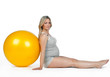 pregnant woman with pilates ball