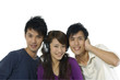 Portrait of happy group of friends smiling listening music