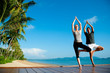 Yoga Couple By Ocean