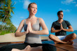 Yoga Couple By Ocean